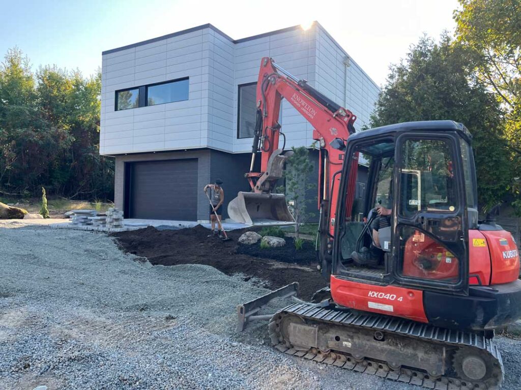 Pose de l’entrée de garage avec bloc perméable des eaux de pluie